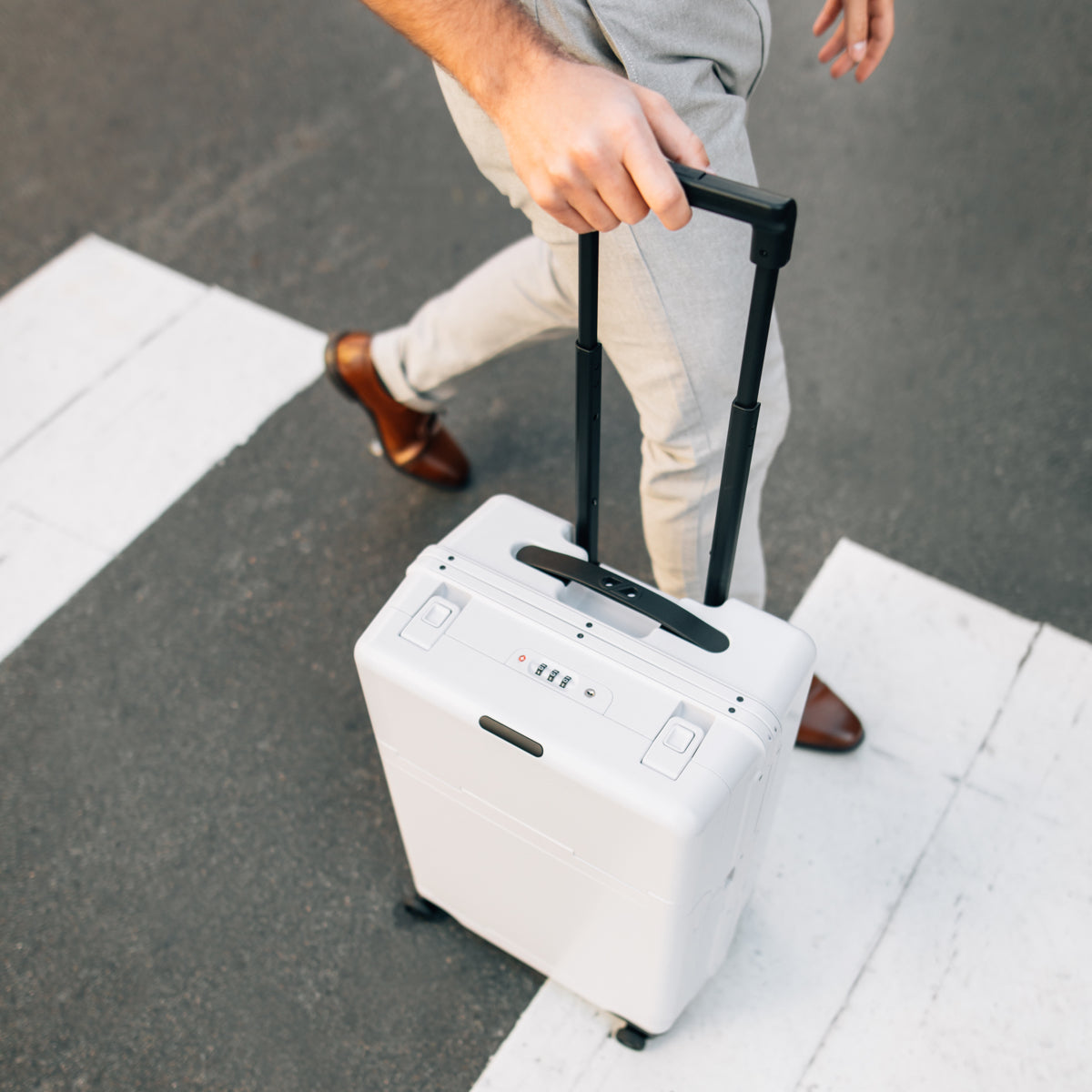 Barmes Cloud White being rolled through a cross-walk